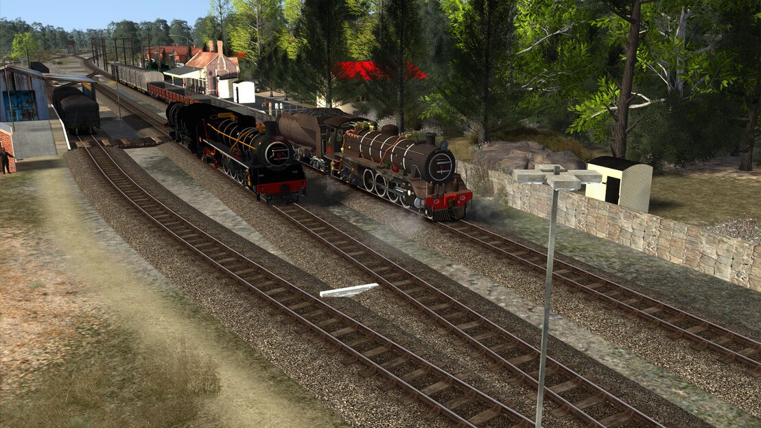 Trainz screenshot of a South African mainline with long freight train