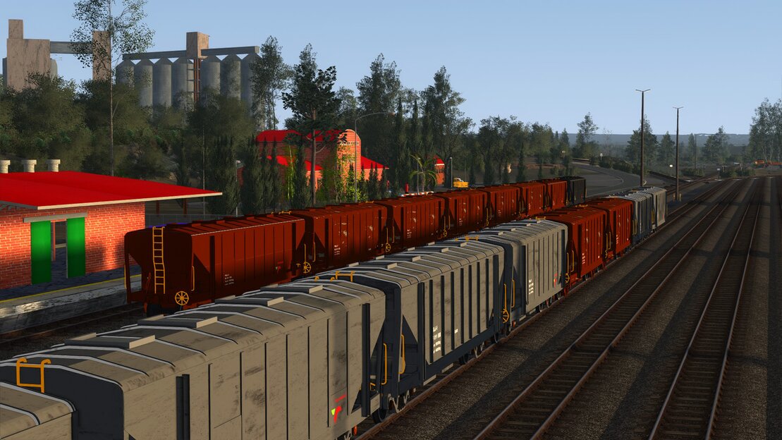 Trainz screenshot of an electric commuter train at a busy South African station