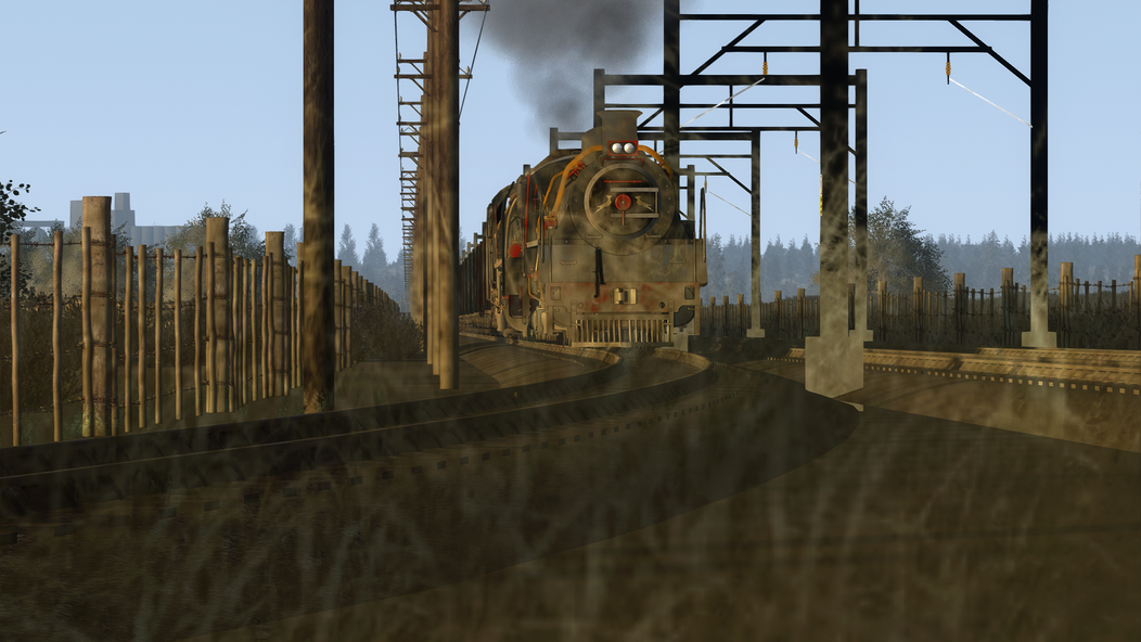 Steam locomotive silhouette at sunset in a train simulator